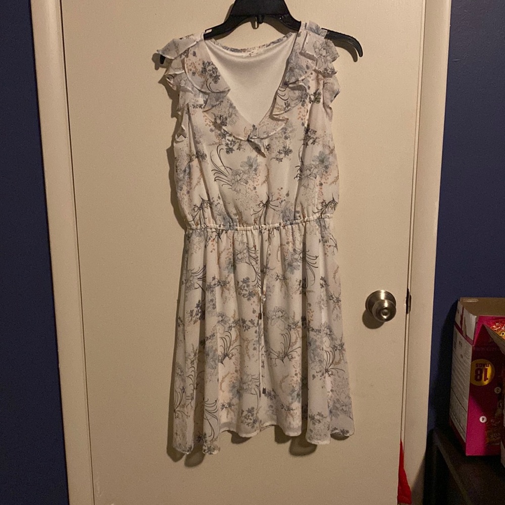Cute Maurice’s dress paired with a teal cardigan